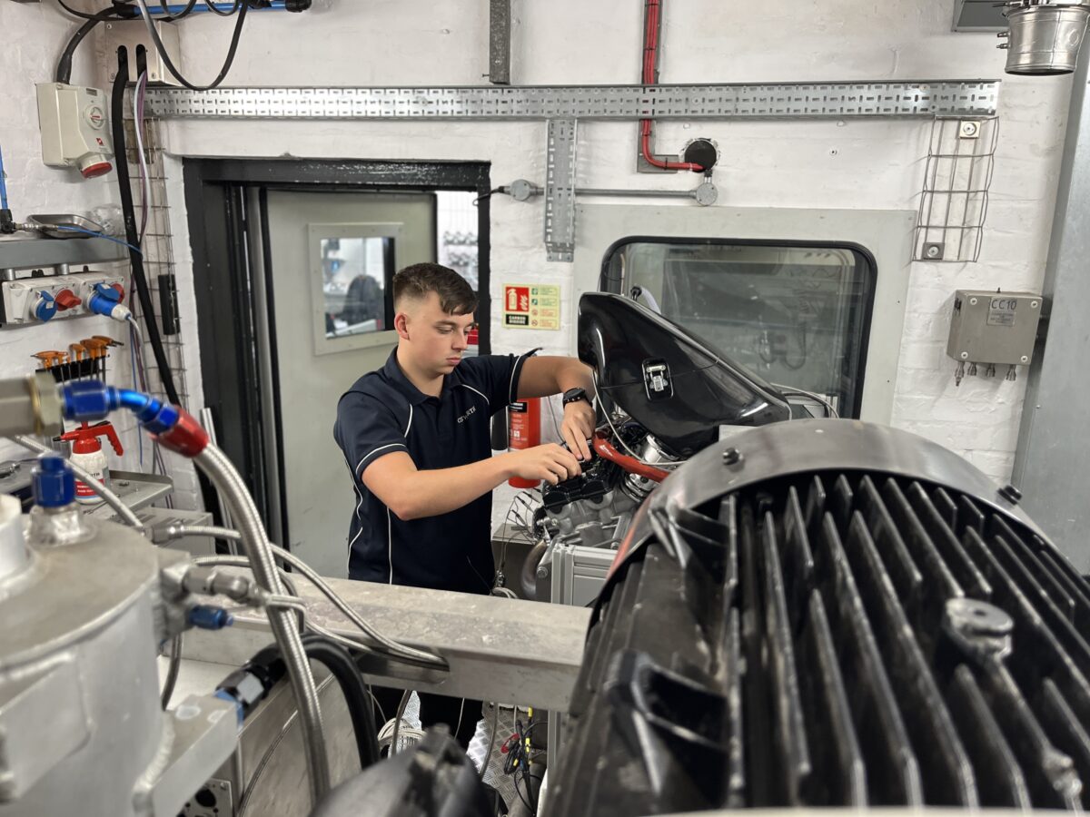 A propulsion technician undertaking maintenance on aviation machinery.