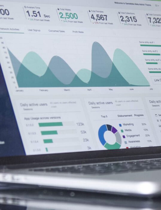 A laptop screen showing data visualisations.