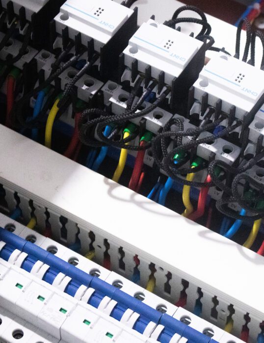 Electrical wires in a circuit breaker box.