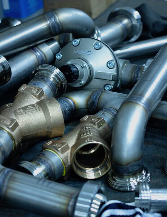 An assortment of metal pipes and connectors.