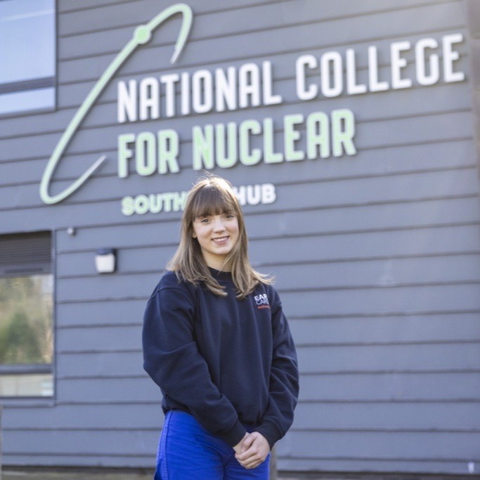 Maintenance and Operations Engineering Technician Anabella, standing in front of the National College for Nuclear.