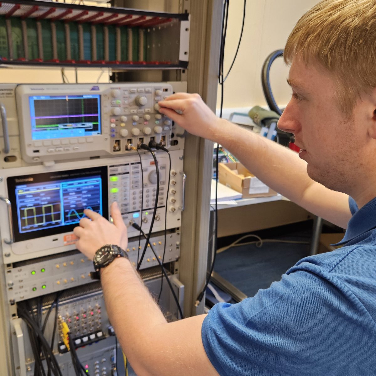 Electrical Engineering Technician Hayden using electronic testing and measuring equipment.