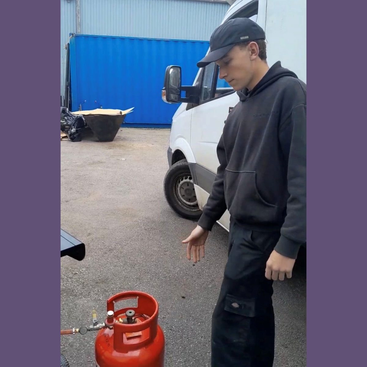 Special Effects Technician Griff, standing in a car park next to a propane gas canister.